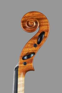 violin in ancient wood head